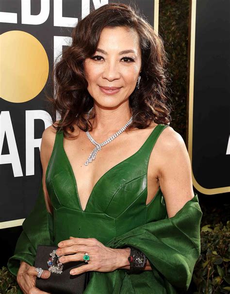 Michelle Yeoh Wears Sparkly Midnight Blue Gown to 2023 Golden Globes