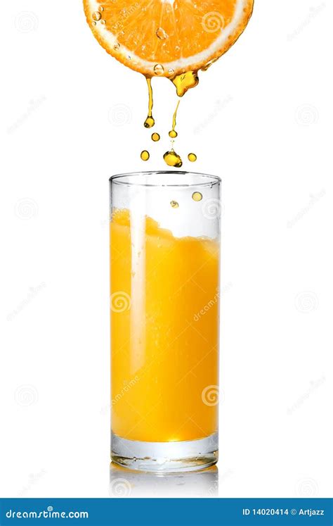 Pouring Orange Juice from Orange into the Glass Stock Photo - Image of ...