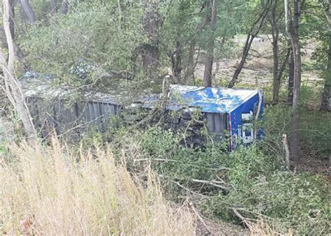 NASCAR hauler crashes down embankment en route to Kansas Speedway