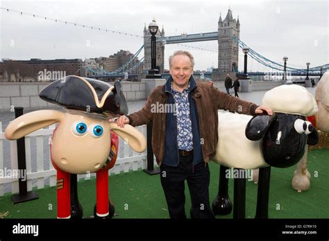 Nick Park, creator of Wallace and Gromit, stands among a flock of Shaun ...