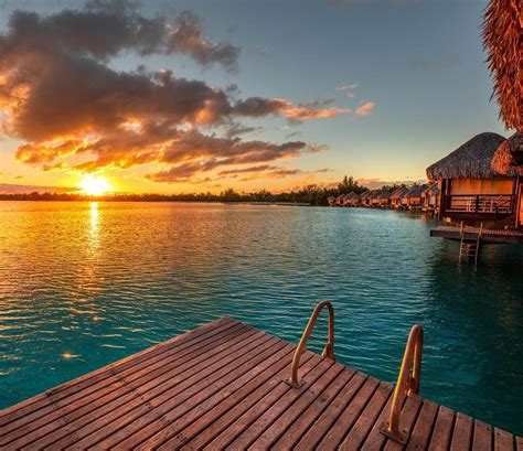 The St. Regis Bora Bora Resort on Instagram: “#bucketlist - Watch a sunrise from an overwater ...