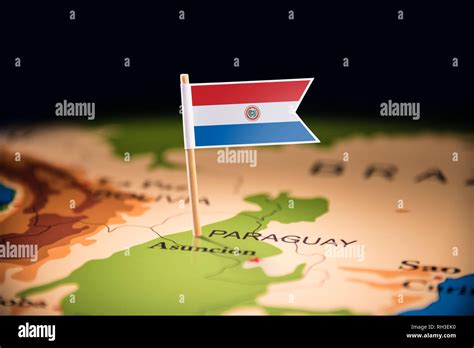 Paraguay marked with a flag on the map Stock Photo - Alamy