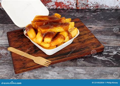 Chips and Gravy stock photo. Image of food, away, classic - 221852836