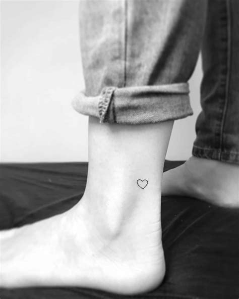 Tiny heart tattoo on the left ankle - Tattoogrid.net