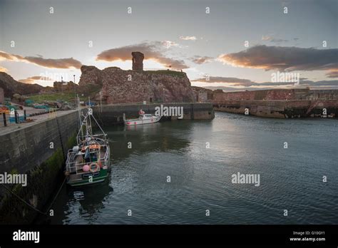 Dunbar Harbour and Castle, Dunbar at sunset, East Lothian, Scotland Stock Photo - Alamy