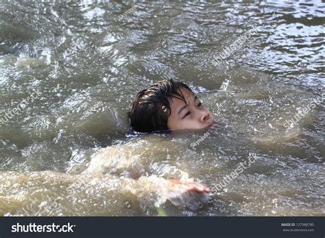 Drowning Swimmer Seeking Rescue Insurance Concept Stock Photo 127988780 - Shutterstock