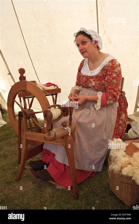 Woman spinning wool using traditional techniques Stock Photo - Alamy