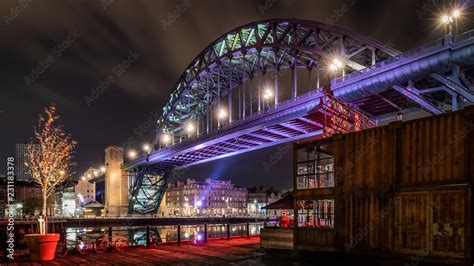 The Tyne Bridge illuminated at night showing the Newcastle quayside Stock Photo | Adobe Stock