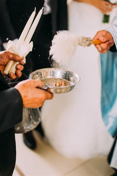 Priest Blessing Luxury Wedding Rings in the Old Church Stock Image ...