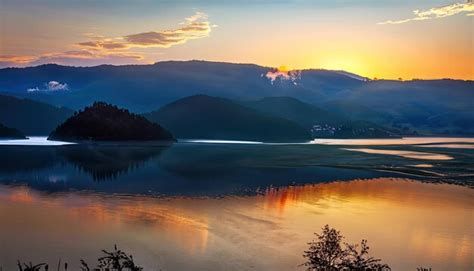 Premium Photo | Photo of sunrise over lake