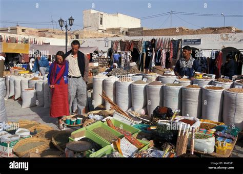 Tunisia.Tunisia. Douz oasis. Sahara desert. Tourists waliking through market Stock Photo - Alamy