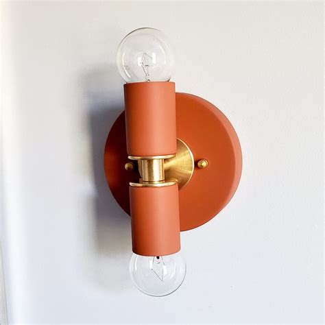Brown terra cotta two light wall sconce | Sconces, Wall lights, Flush mount ceiling lights