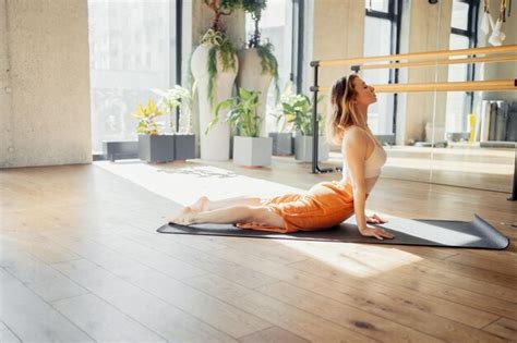 Premium Photo | Yoga balance and harmony in training a woman exercises ...