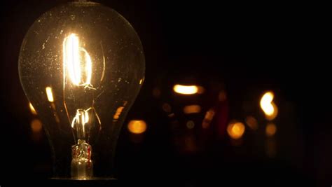 light bulb illuminates dark room much Stock Footage Video (100% Royalty ...