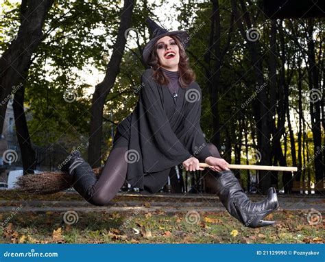 Witch Fly on Broomstick Outdoor. Stock Photo - Image of halloween, dress: 21129990