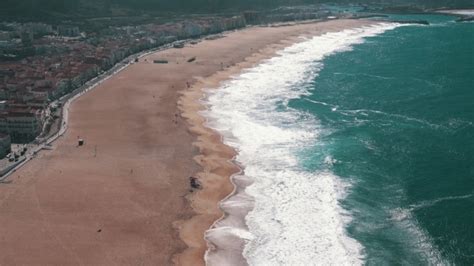 Ocean Beach In The Portuguese Town Of Nazare, Stock Footage | VideoHive