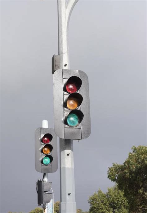 Free Image of traffic lights and stormy sky | Freebie.Photography