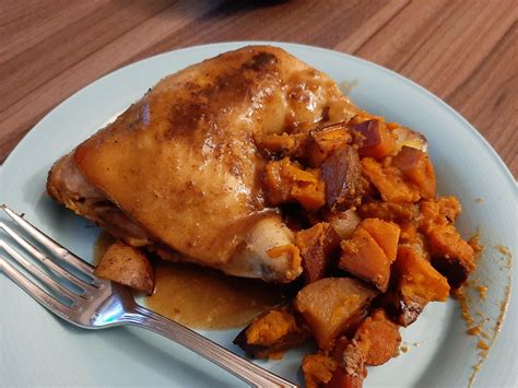 Slow cooker chicken leg quarters with sweet potatoes, carrots, and russet potatoes and honey ...