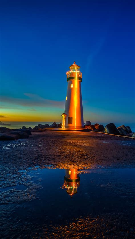 Lighthouse in beach at sunset Wallpaper ID:6166