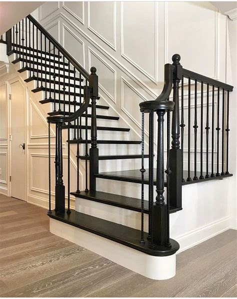 Black and White Staircase with Wooden Floor