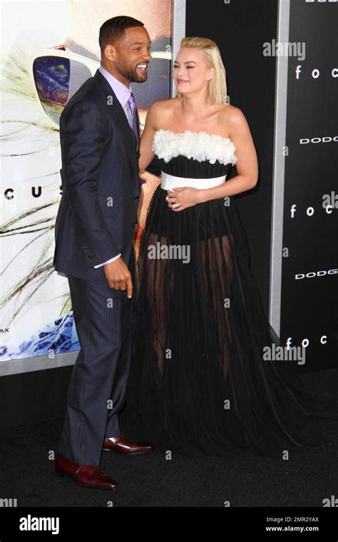 Will Smith and Margot Robbie at the Focus Los Angeles World Premiere at the TLC Chinese Theatre ...