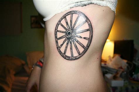 wagon wheel tattoo meaning - gracocarseatadaptersavee