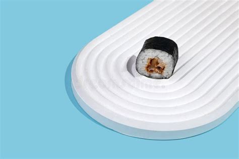 Hosomaki Sushi, Rolls with Eel on a White Plaster Stand on a Blue Plain Background Stock Image ...