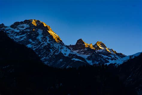 Silhouette of Mountains During Sunrise · Free Stock Photo