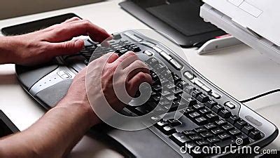 Business Man or Professional Programmer Typing on Ergonomic Keyboard with Ergonomic Mouse in ...