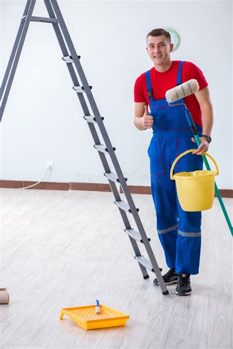 The Male Painter Preparing for Painting Job at Construction Site Stock Image - Image of ...