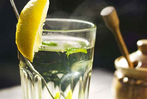 Warm Lemon Water Benefits and Side Effects - Turning the Clock Back