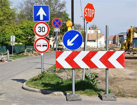 Road Signs at the Road Construction Stock Image - Image of arrow, limit ...