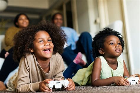 African children playing video games | Free Photo - rawpixel