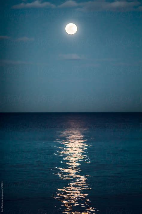 "Night,reflection Of The Full Moon In The Sea, Colorful" by Stocksy ...