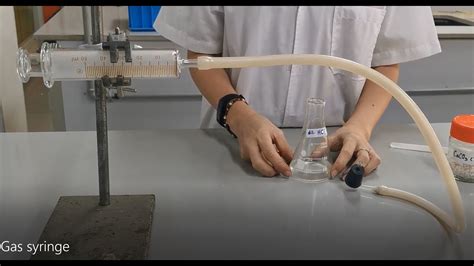 Using a gas syringe for collecting and measuring gas volumes - YouTube