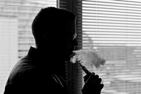 Vaping Man With Electronic Cigarette / E Cig / Vapouriser | Flickr