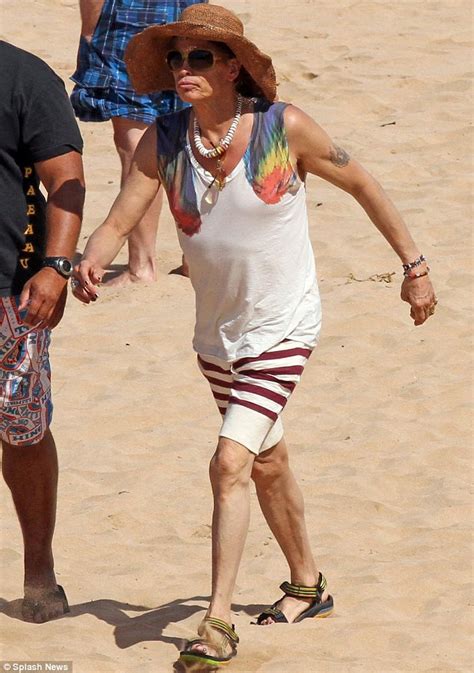 Steven Tyler steps back in time as he sports retro shorts on the beach ...