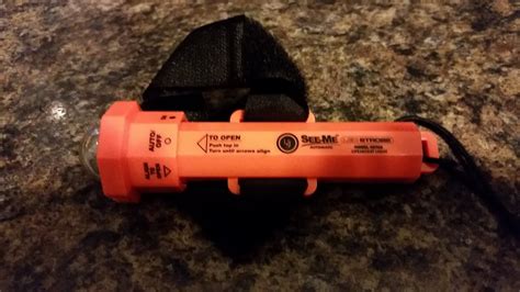 ULTIMATE SURVIVAL TECHNOLOGIES SEE-ME LED STROBE LIFE JACKET LIGHT: GEAR REVIEW - YouTube