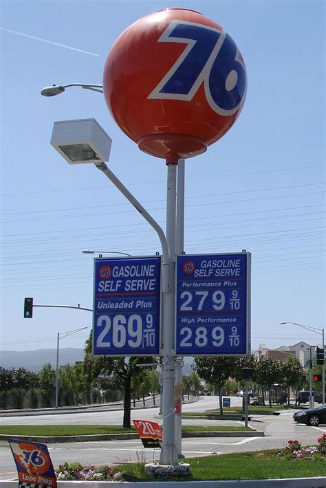 File:76 ball sign with signs and light.jpg | Old gas stations, Gas station, Old gas pumps