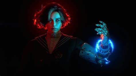 a woman holding a robot in her hand with glowing blue and red lights on it