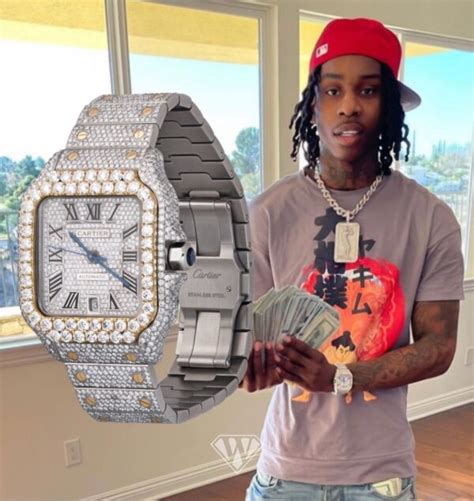 Rapper Polo G with his Diamond Cartier Santos - Superwatchman.com