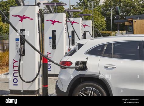 The future is here: electric vehicles charging at an electric vehicle ...