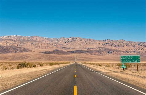 Empty infinite road in the desert of Death Valley California – Trip Memos