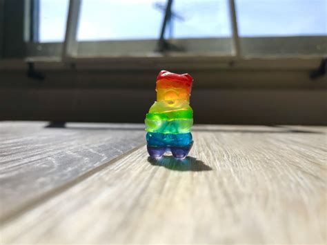 Rainbow gummy bear made from slices of different colored bears ...