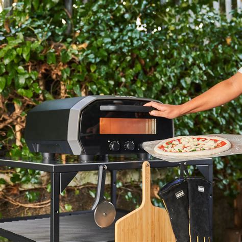 The Ooni Volt 12 Electric Pizza Oven Cooks Pizzas Indoors or Out in 90 Seconds