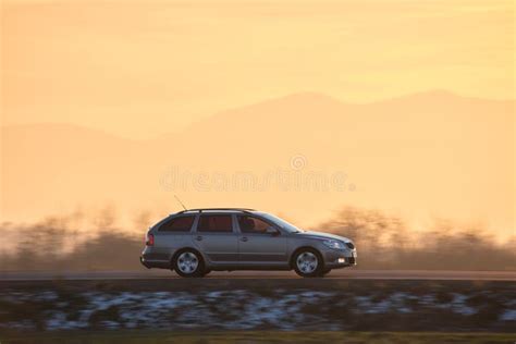 Car Driving Fast on Intercity Road at Sunset. Highway Traffic in Evening Stock Photo - Image of ...