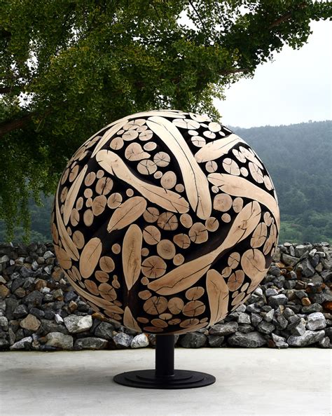 Korean Artist Turns Discarded Tree Trunks And Branches Into Art