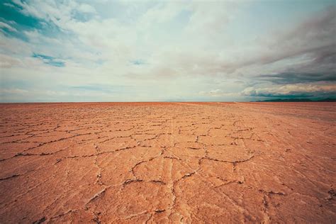 HD wallpaper: empty desert under white cloudy sky at daytime, dry land under cloudy sky ...