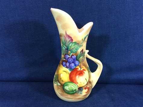 Vintage Ucagco Ceramics Pitcher Vase Fruit Design Set On A
