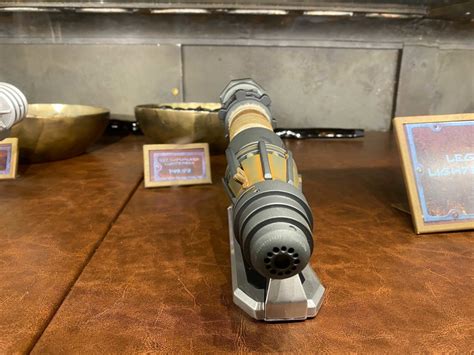 PHOTOS, VIDEO: NEW Rey Legacy Lightsaber Hilt Rises in Star Wars: Galaxy's Edge at Disneyland ...